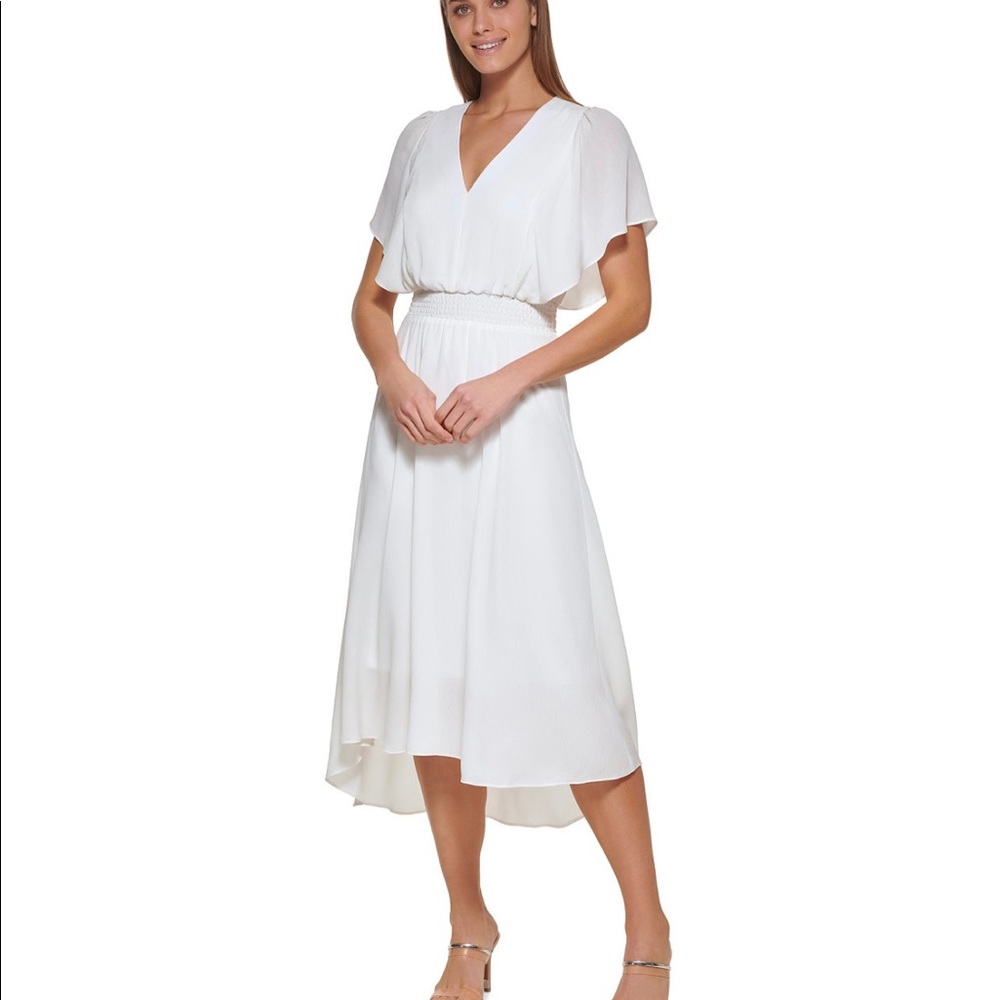 flowy midi white dress DKNY fluttery sleeves & a smocked waistband. Used once